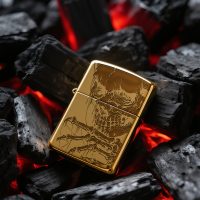 Zippo lighter with a sharp skull design precision-engraved via fiber laser, showcasing the vector artwork's details